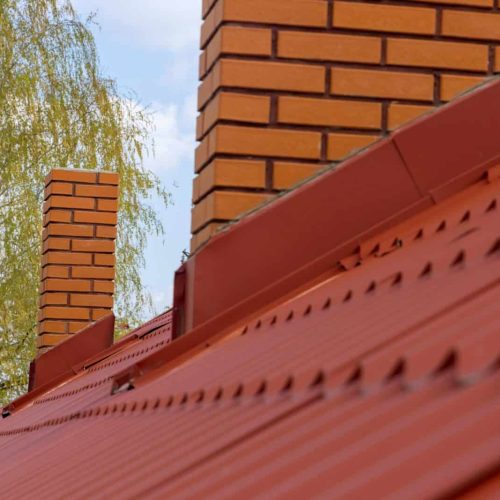 Roof housetop with red roofing tiles