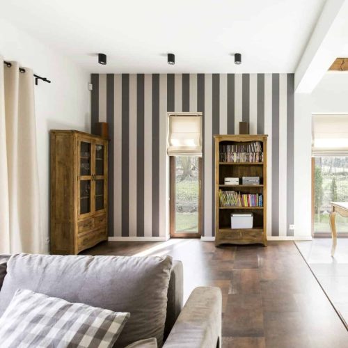 Stylish interior with striped wallpaper