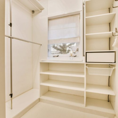 Wardrobe in light room at home